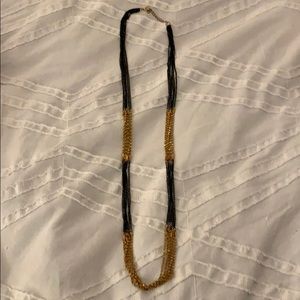 Long black and gold chain necklace